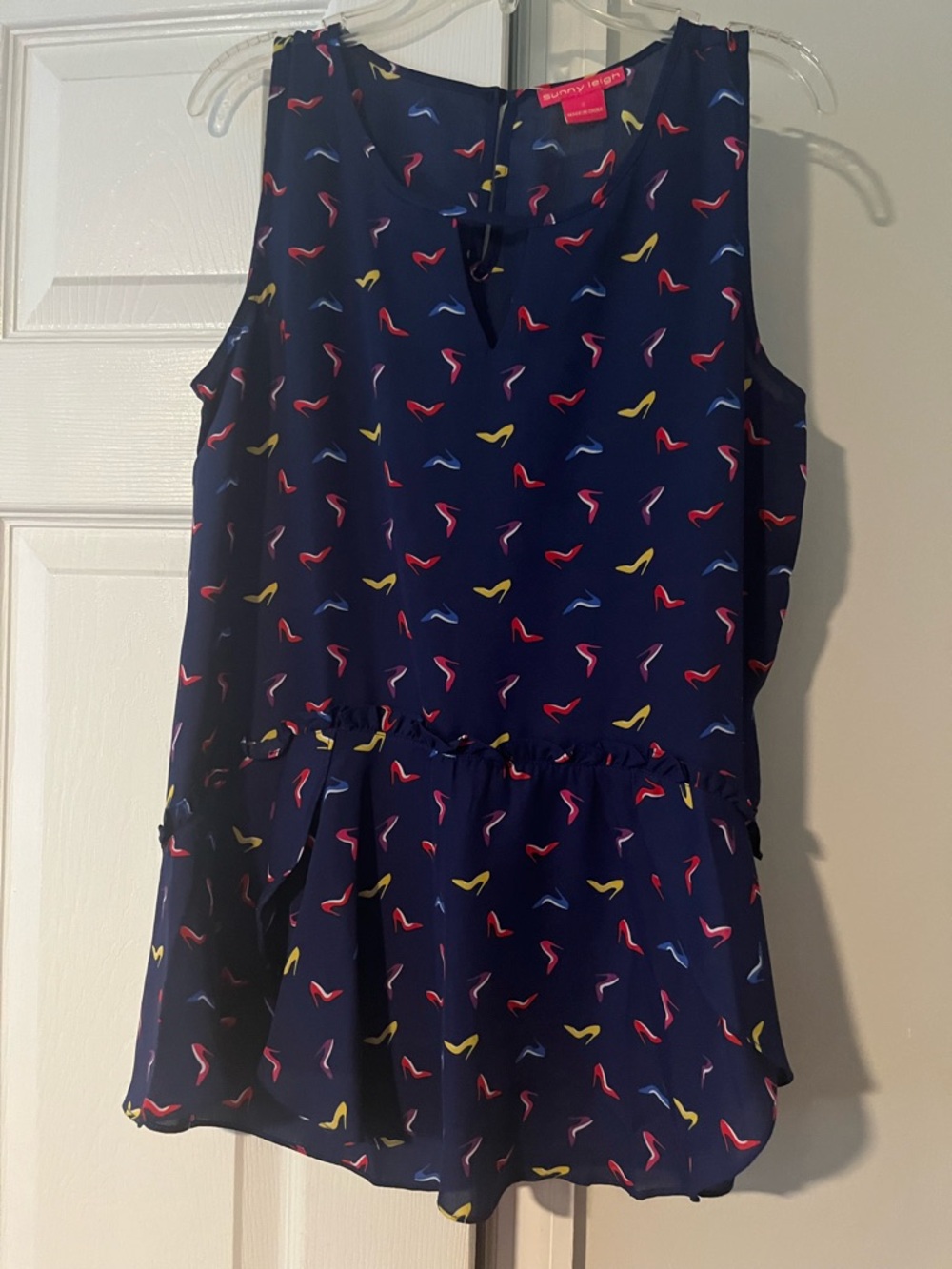 Sunny Leigh Navy Sleeveless Top with Red, Yellow and Blue Heel Print